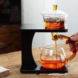 RORA glass gravity tea set dispensing tea from the steeping bowl into the pitcher